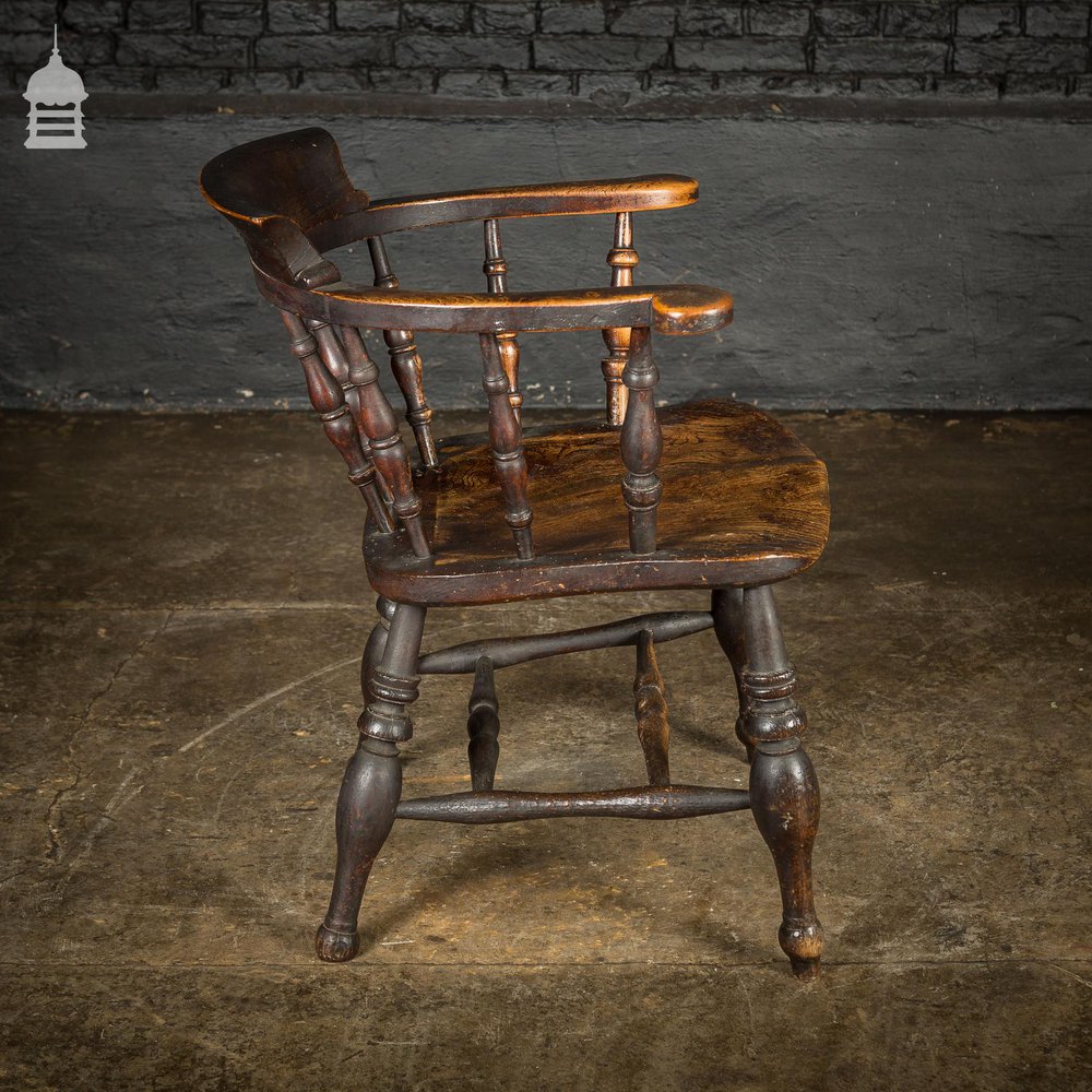 19th C Captains Bow Seat Smokers Chair with Turned Arm Supports and Double H Stretcher