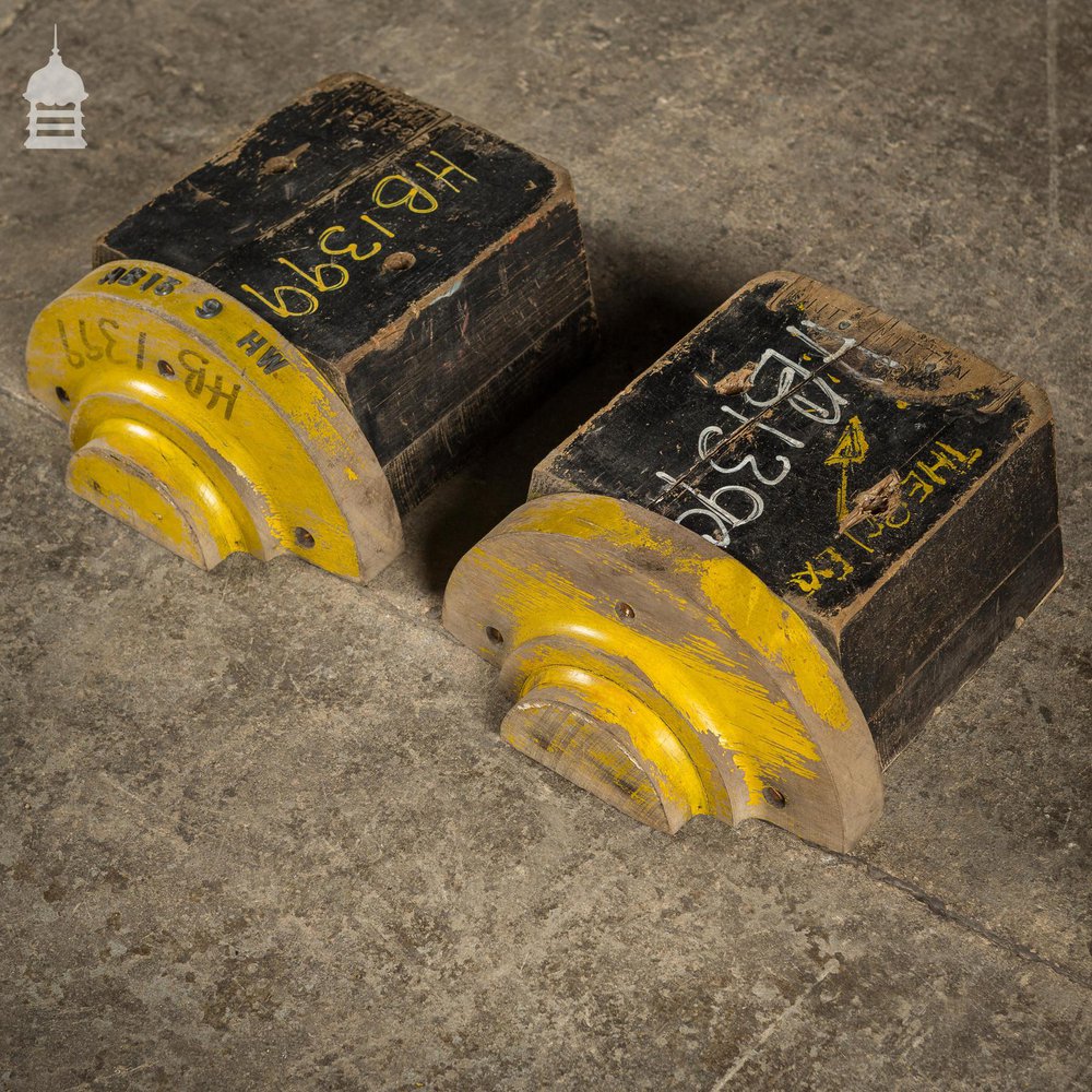 Pair of Black and Yellow Industrial Factory Foundry Moulds