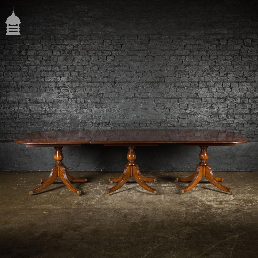 Exceptional Georgian Style Mahogany Four Pillar Table with Brass Castors
