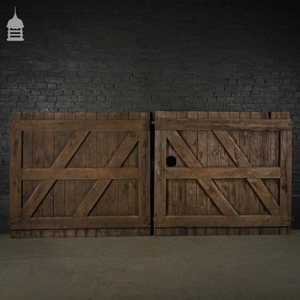 Pair of Reclaimed Pine Ledged and Braced Barn Doors with Double Latch Mechanism