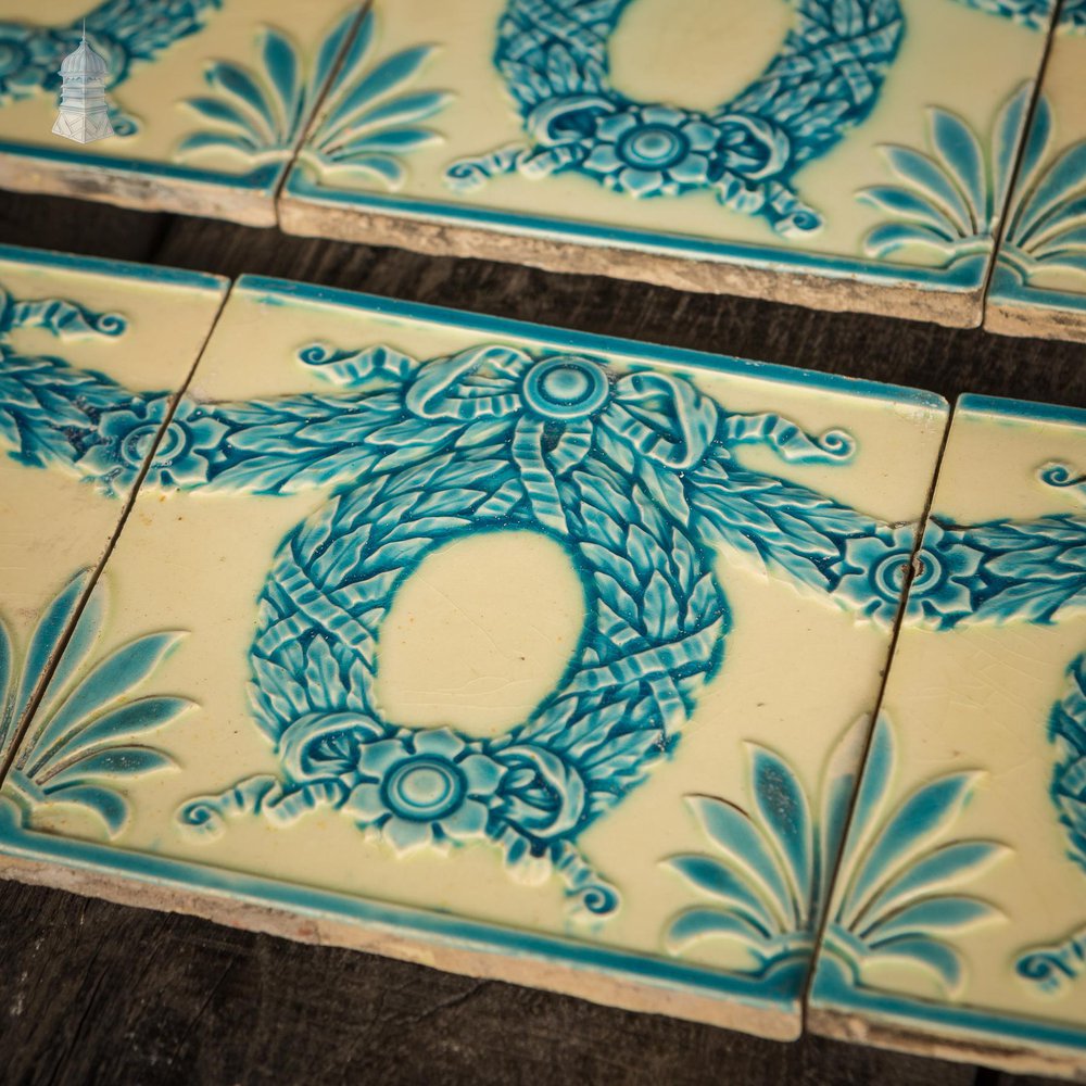 NR57021: Set of 10 Minton, Hollins & Co Blue Glazed Tiles with Bow and Wreath Design