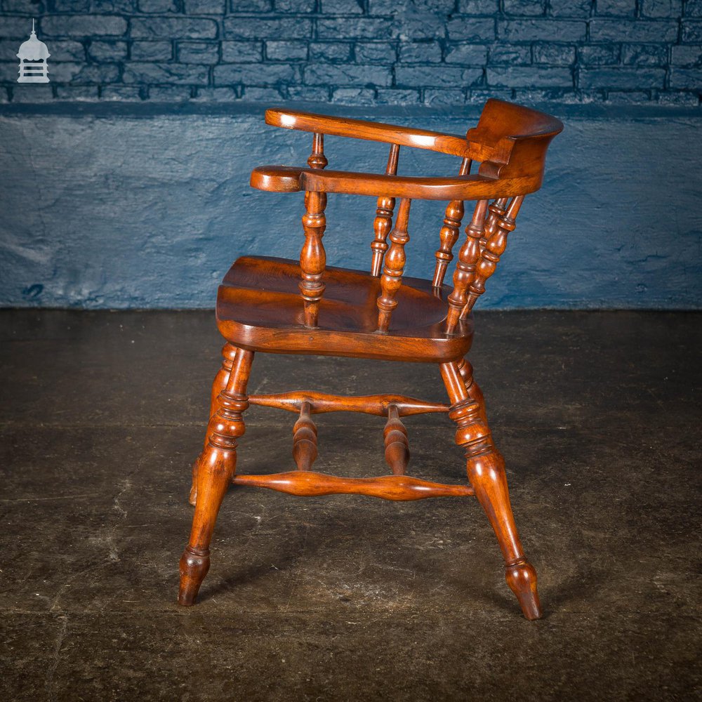 19th C Elm Captain’s Bow Seat Smokers Chair with Turned Arm Supports and Double H Stretcher
