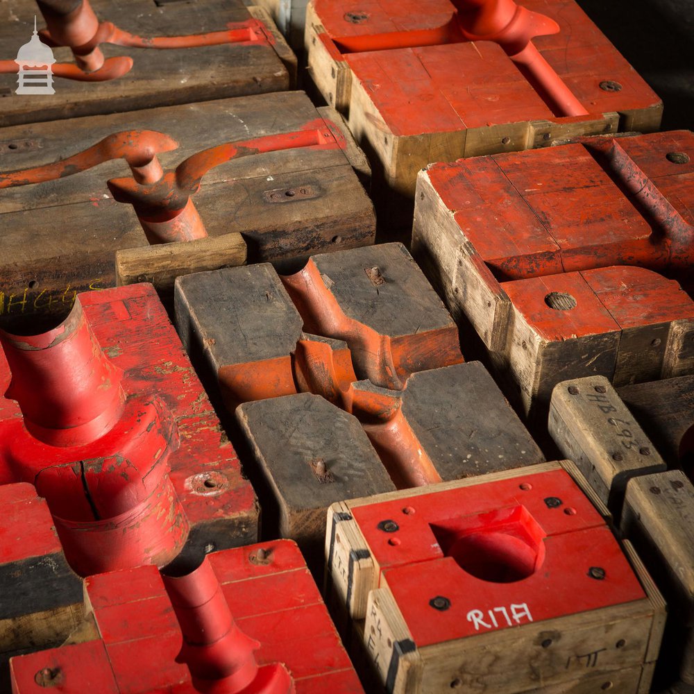 Collection of 18 Red and Black Industrial Factory Moulds