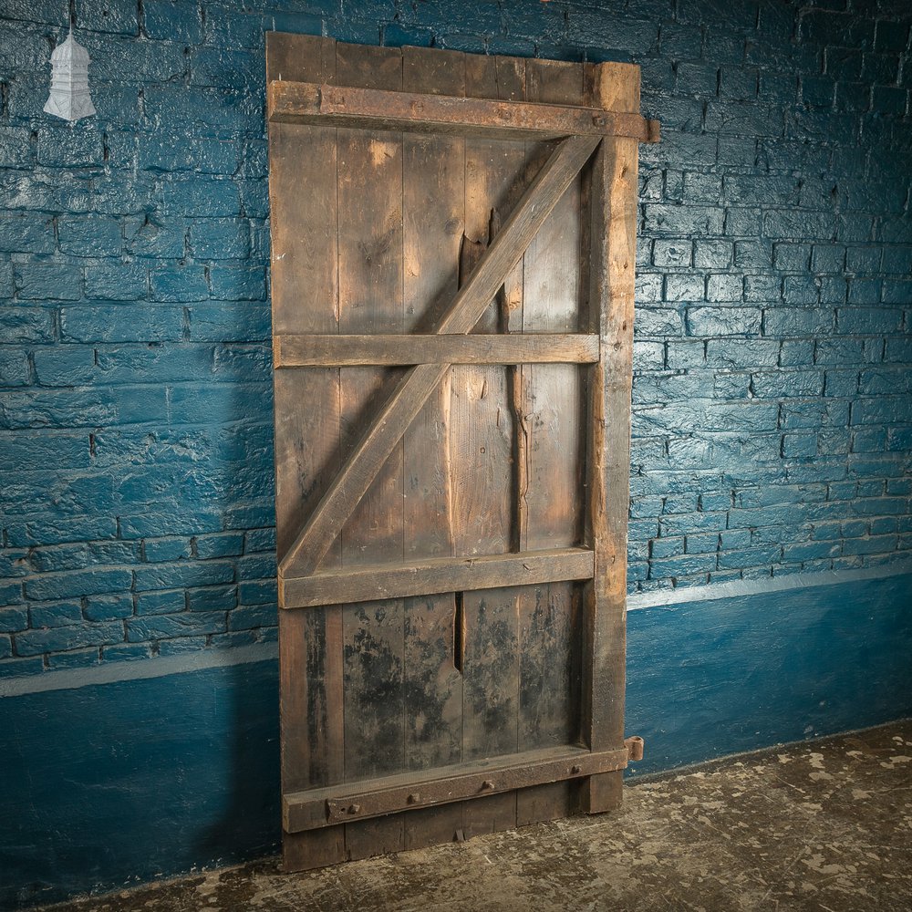 Rustic Pine ledged and Braced door with Large Iron strap hinges