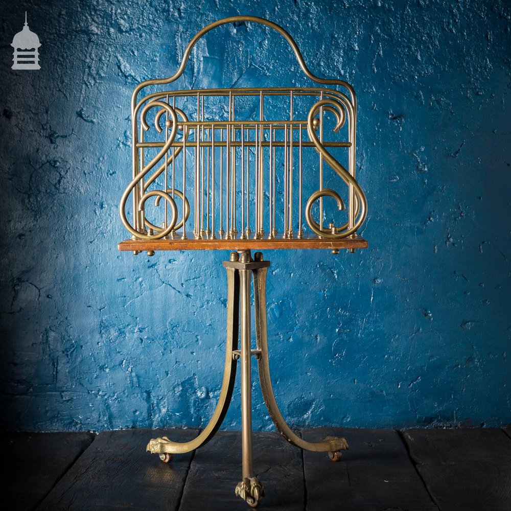 19th C Brass and Oak Swivel Sheet Music Or Record Rack With Claw Feet, Ceramic Castor’s and Treble Clef Design