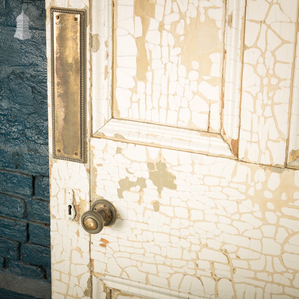 Reclaimed 4-Panel Door – Cracked White Paint