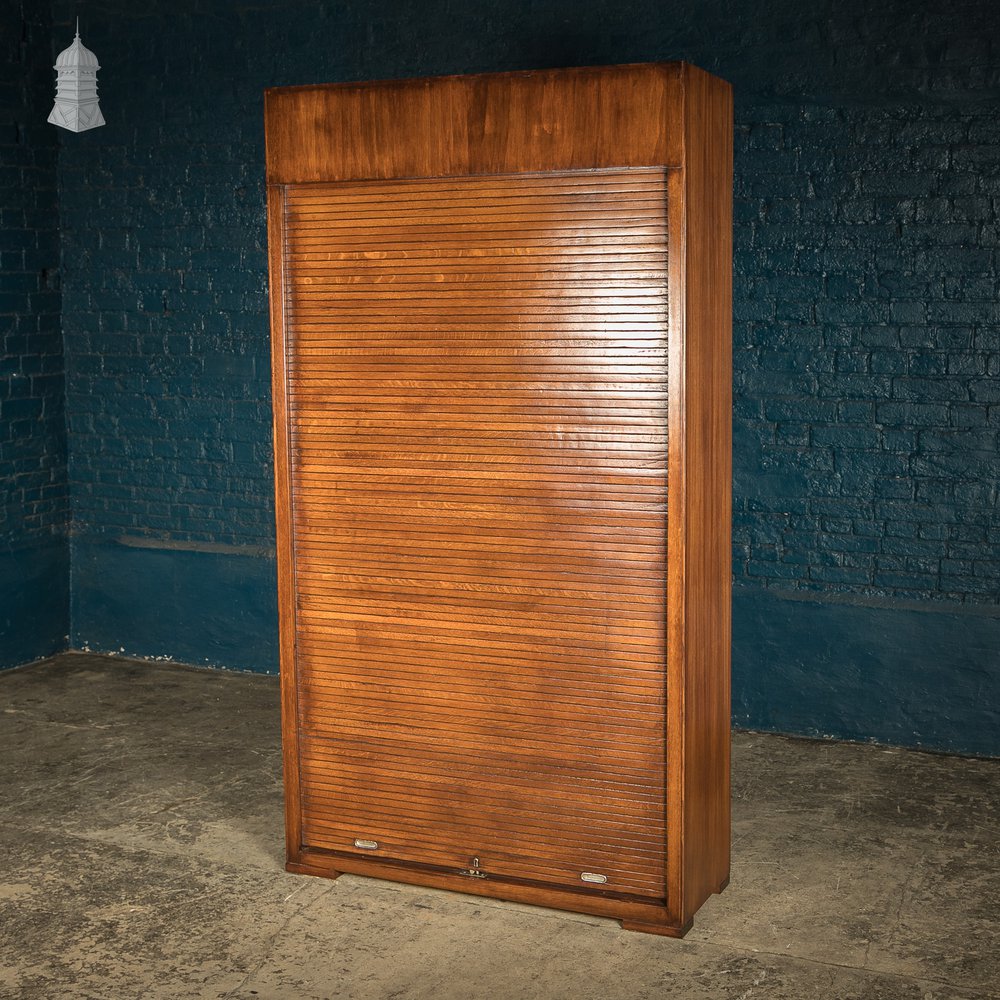 Tambour Front Cabinet, Mahogany and Oak Construction with internal pigeonhole shelving from a liner