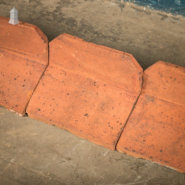 Capped Ridge Tiles, A Batch of 55 Reclaimed Terracotta