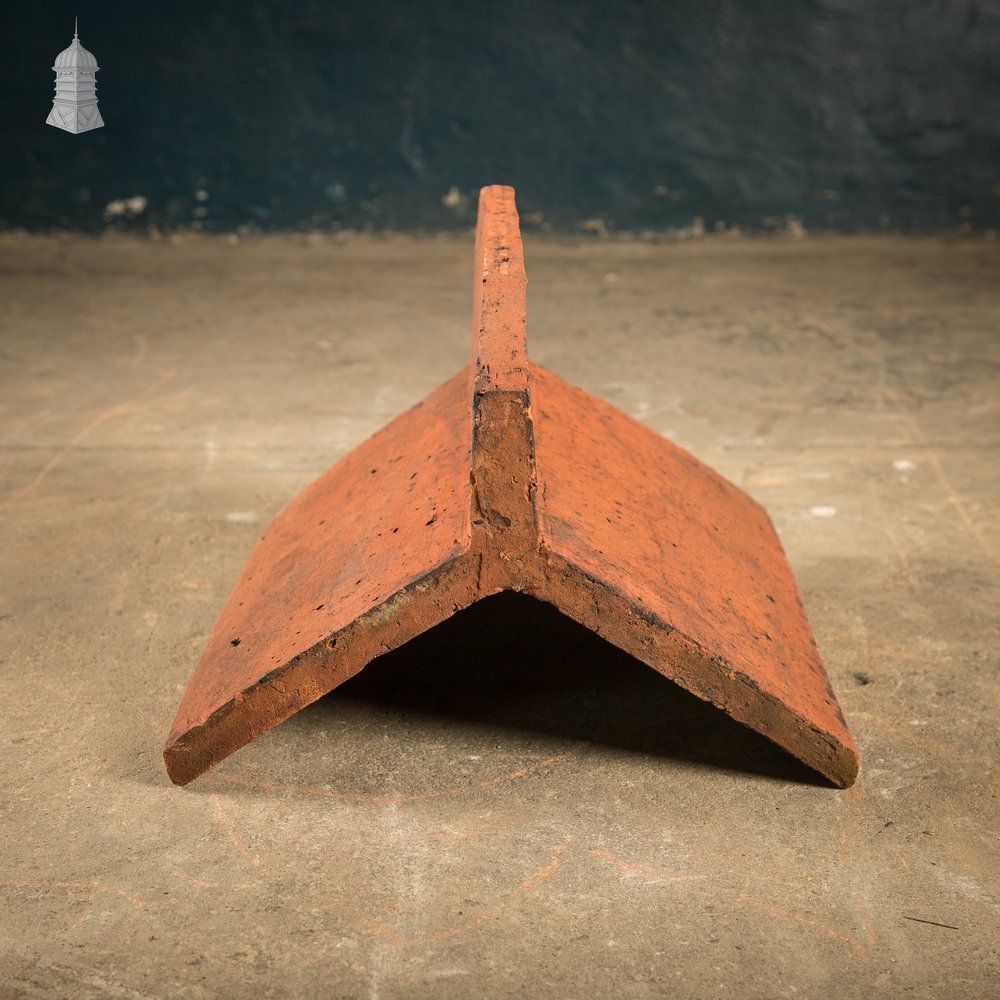 Capped Ridge Tiles, A Batch of 55 Reclaimed Terracotta